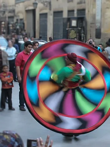 A Tanoura dancer's skirt spun out into a concentric disc of colour